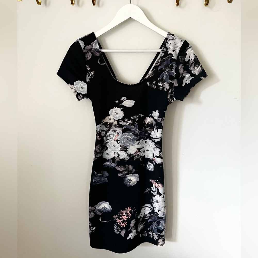 Navy floral body con dress with cross detail in back